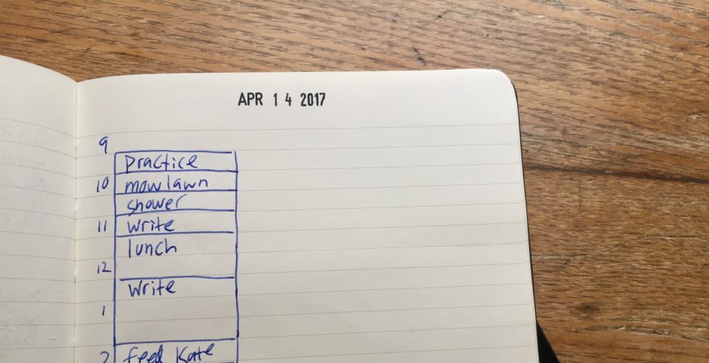 daily schedule in Moleskine notebook